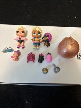 L.O.L. Surprise! Dolls Set with Pink, Brown, Black and Gold Accessories